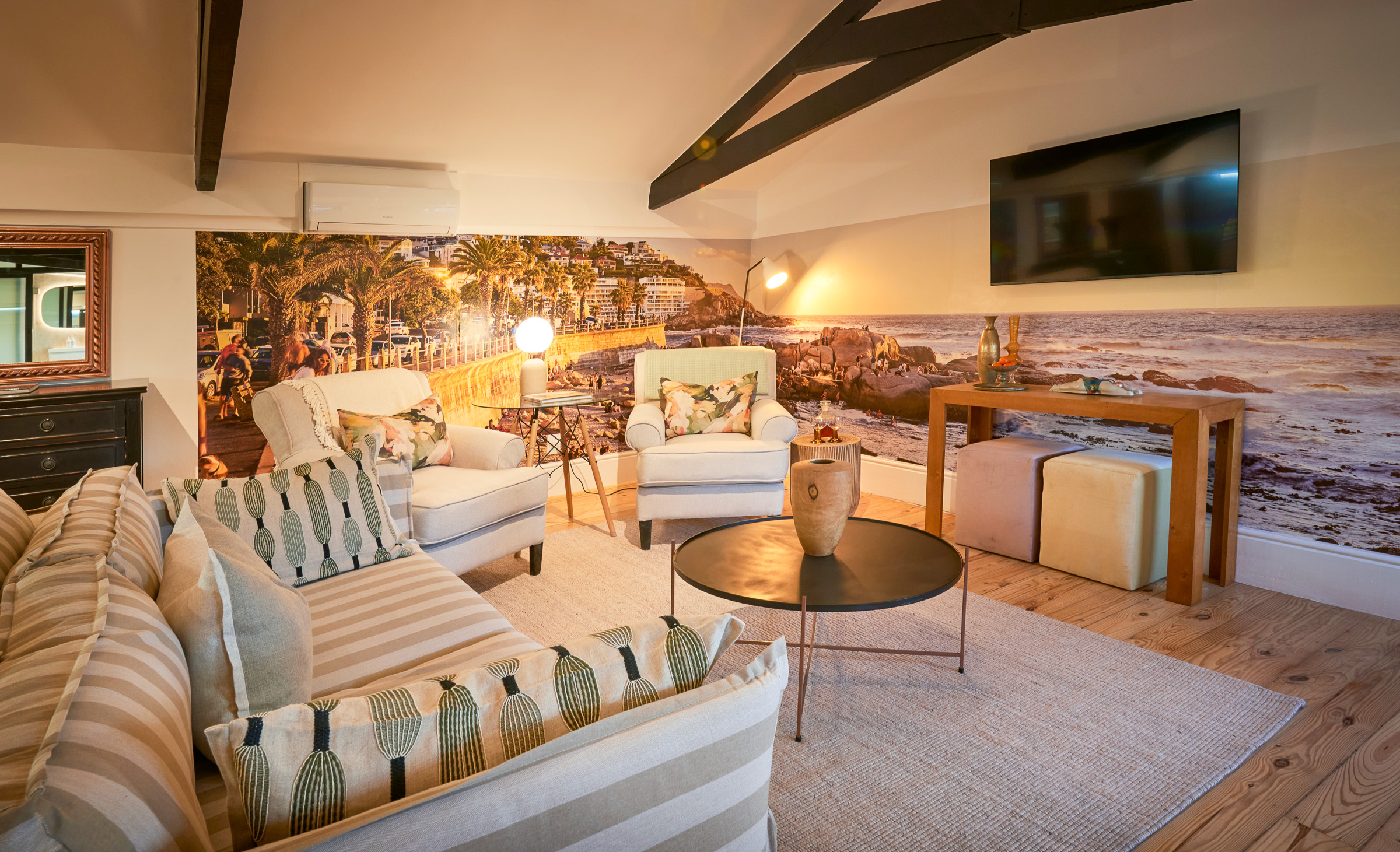 Timber & Tide living area under the roof trusses
