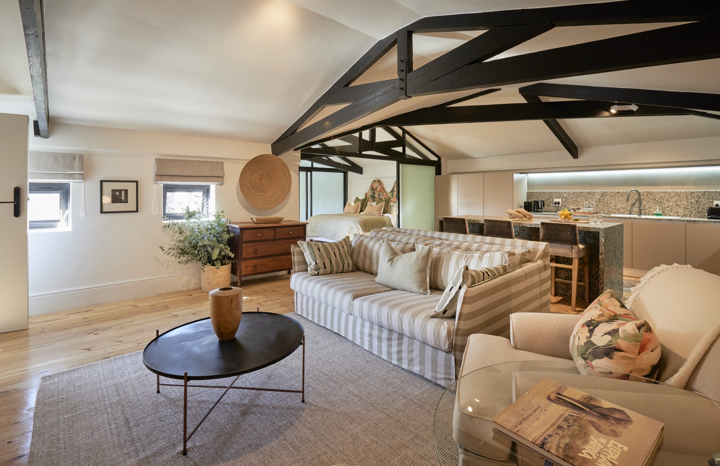 The upstairs loft, under the building's original king-post trusses