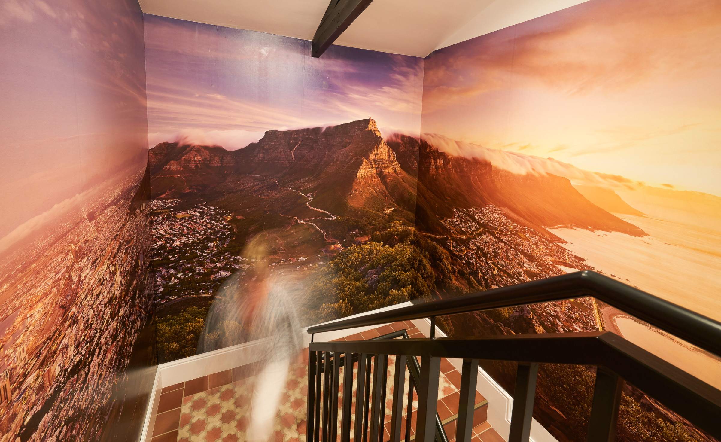 The stairwell, wrapped in a Table Mountain mural